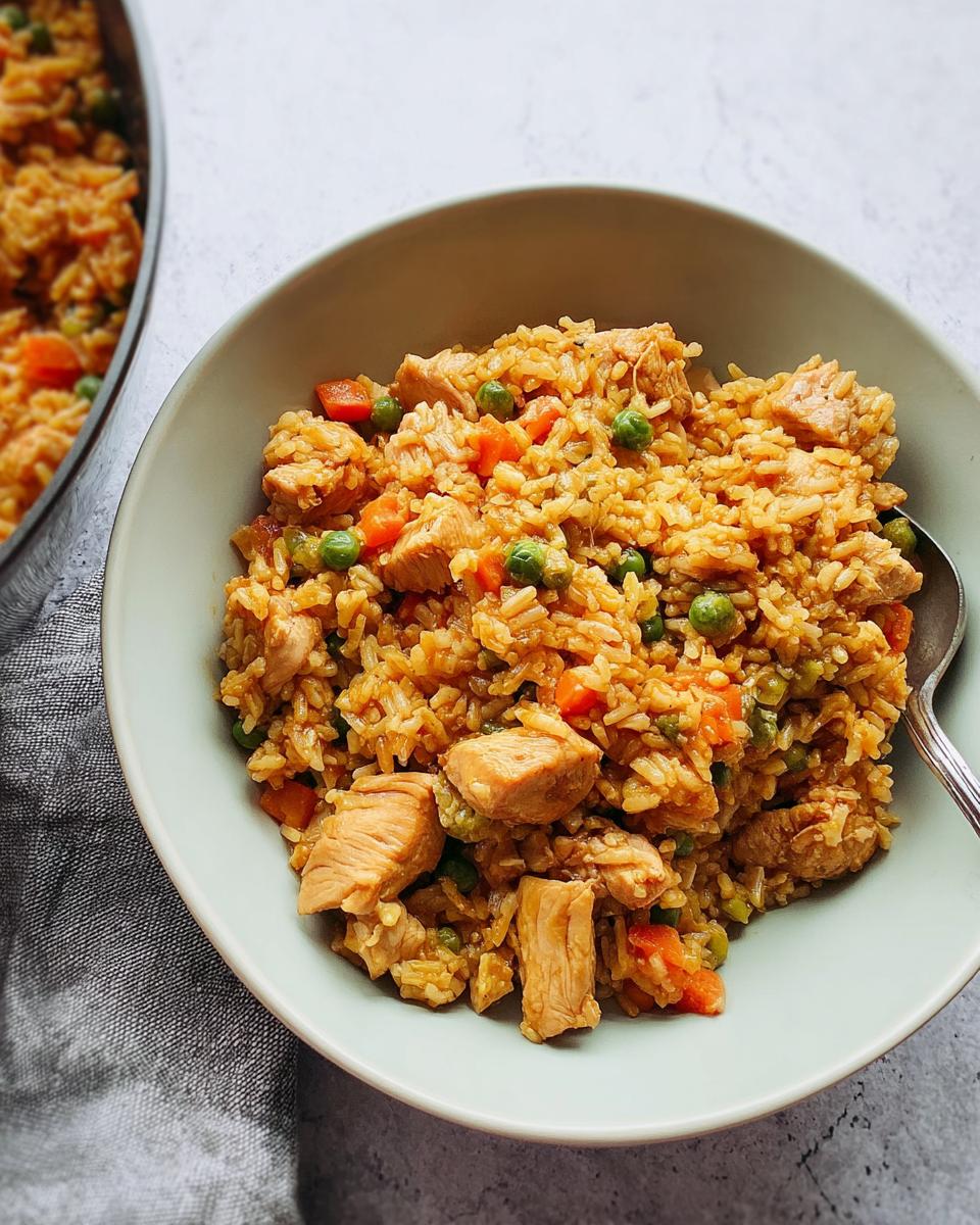 A delicious bowl of chicken and vegetable rice, part of our 12-minute Rice Bowls Recipes.