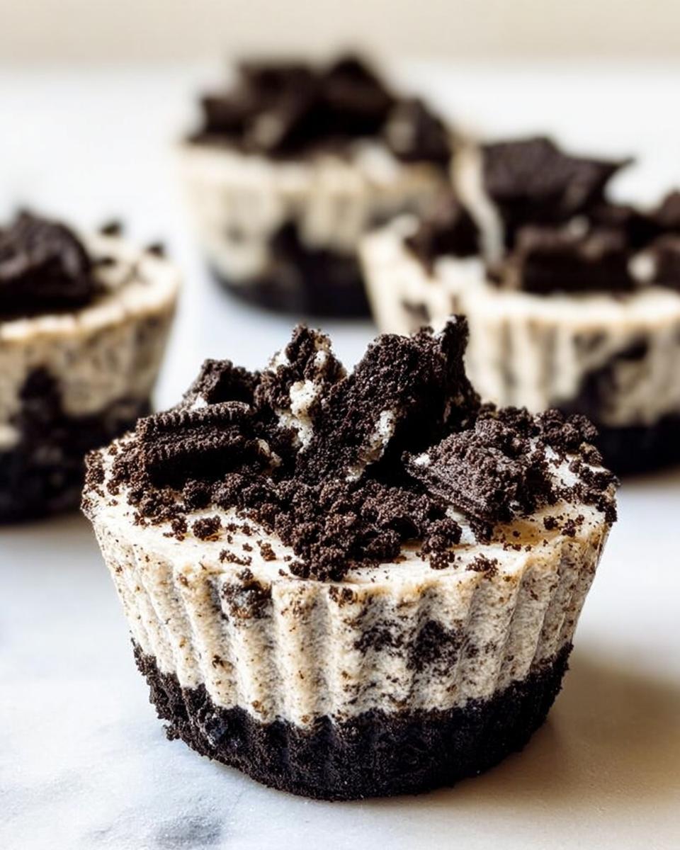 Close-up of a Healthy No-Bake Oreo Cheesecake Bite topped with crushed Oreos.